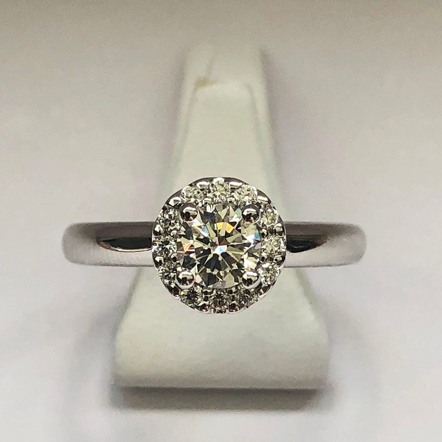 Solitaire diamond with on sale halo